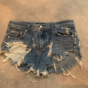Distressed denim shorts